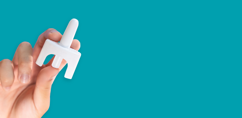 Person holding naloxone nasal spray
