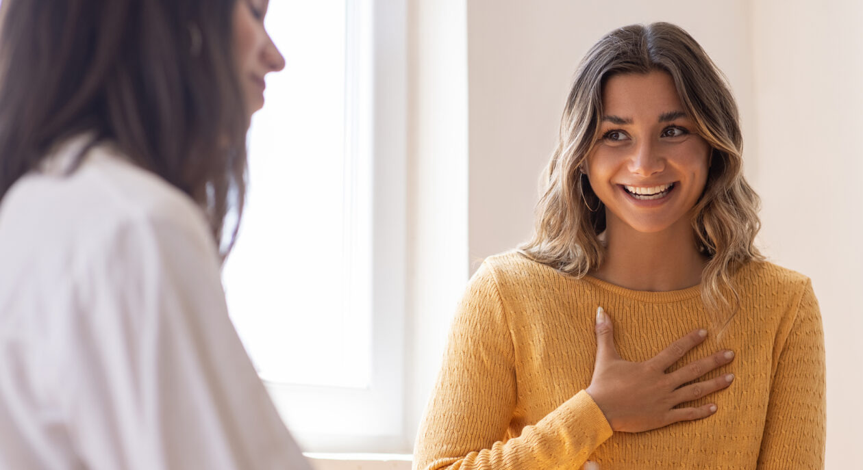 woman at clinic talking to a female doctor